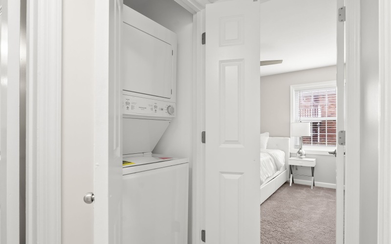 a washer and dryer in a closet